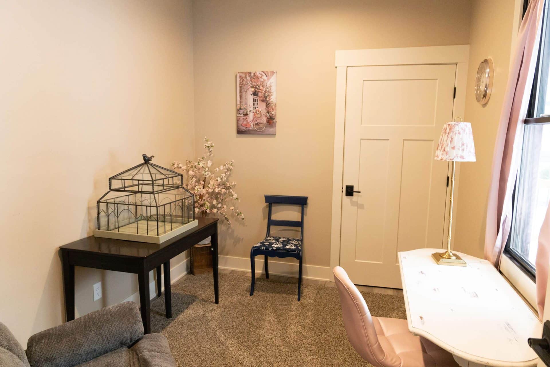 Interior room with desk, chair, and decorative accents at Livingston Homes.