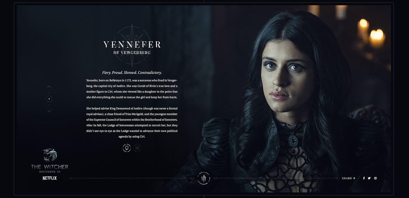 A young woman with dark hair and a serious expression, dressed in dark clothing, in a dimly lit setting.