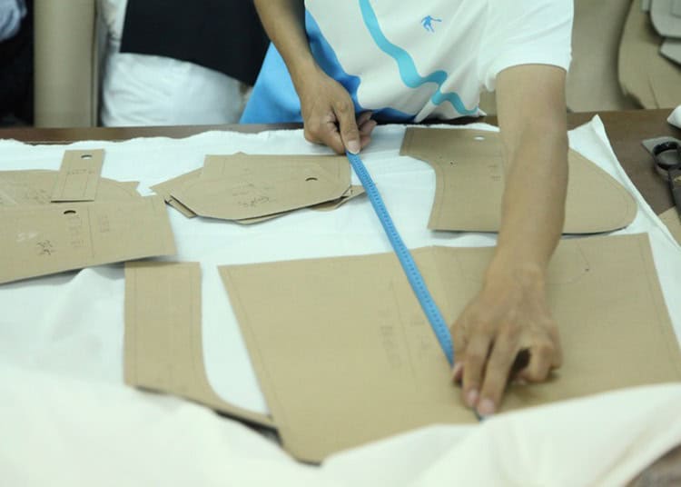 Cut and sew apparel production process by Lyonix Apparel