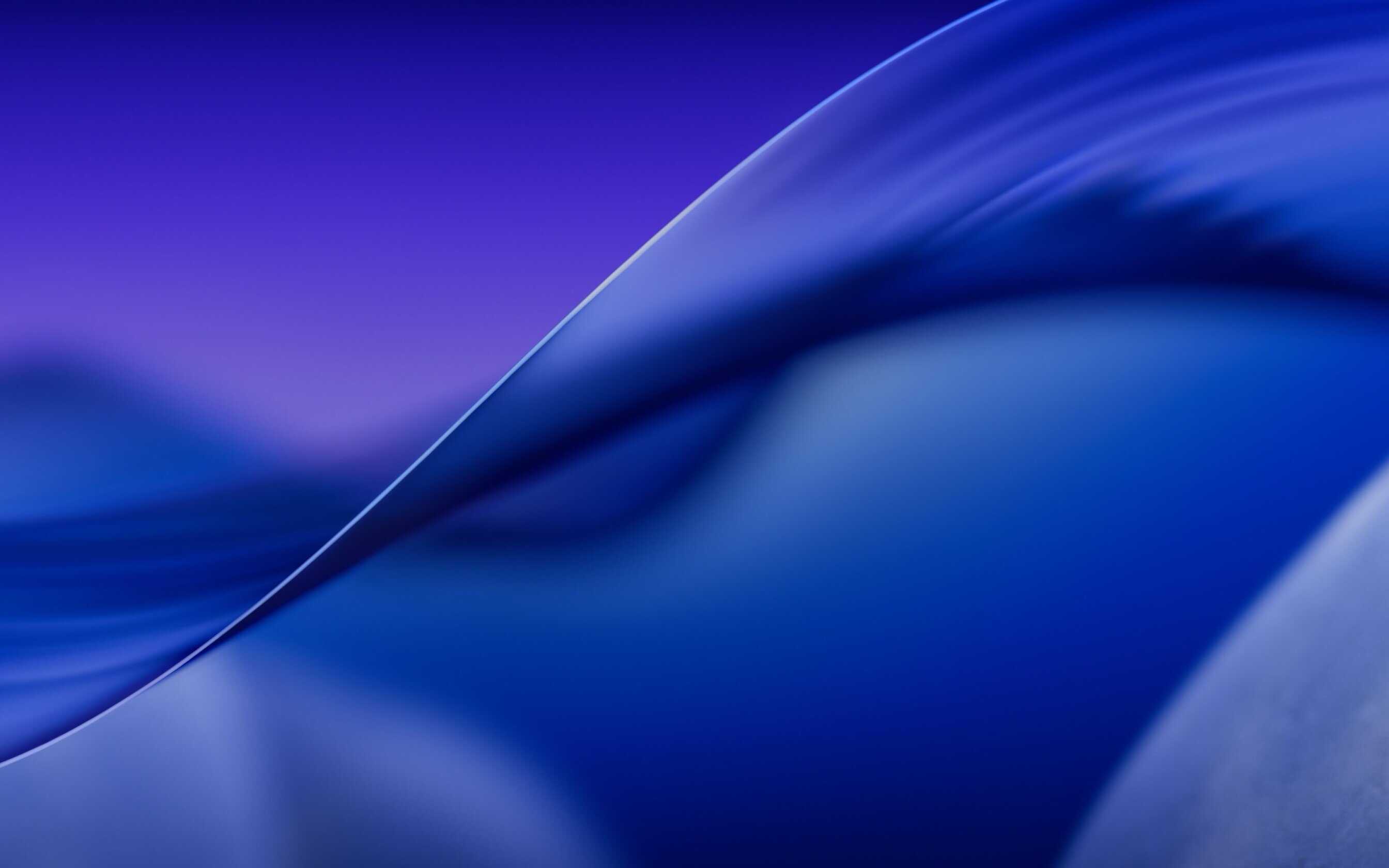 Här får du tag i macOS 26:s nya bakgrundsbilder