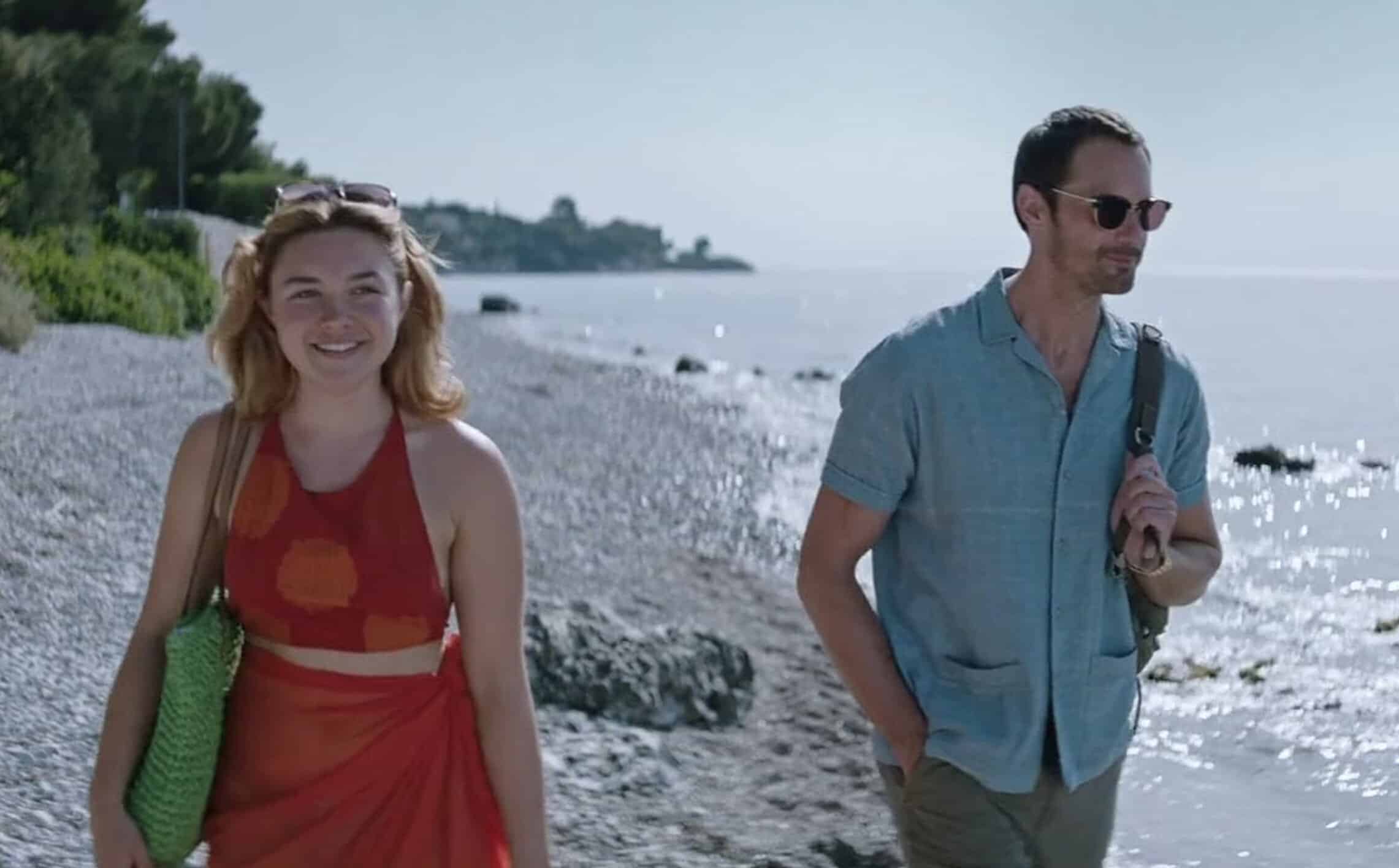 1. Alt text: Moderna kläder för sommarutflykt vid stranden, kvinna i röd klänning och man i ljusblå skjorta, Macken butikus friluftskläder i Sverige.