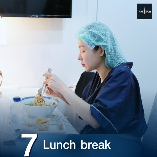 Patient at Max Hair Clinic rests and eats as part of the Hair Transplantation process