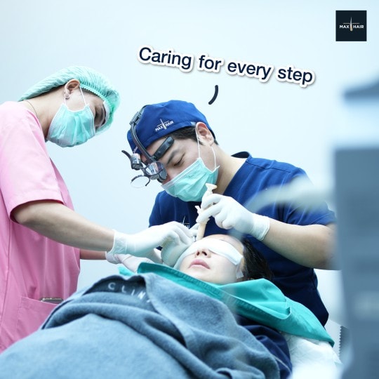 Doctor performs graft extraction on a patient at Max Hair Clinic in Thailand