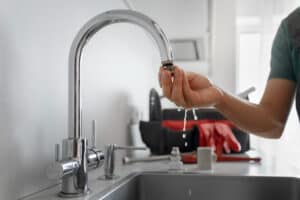 FAUCET WATER LEAK REPAIR BY PROFESSIONAL HVAC AND PLUMBING TECHNICIANS FOR RELIABLE SERVICE.