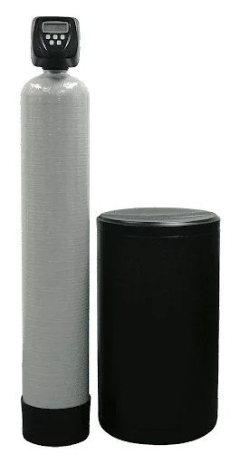 A water softener system with a tall resin tank featuring a digital control head, next to a shorter, cylindrical brine tank.