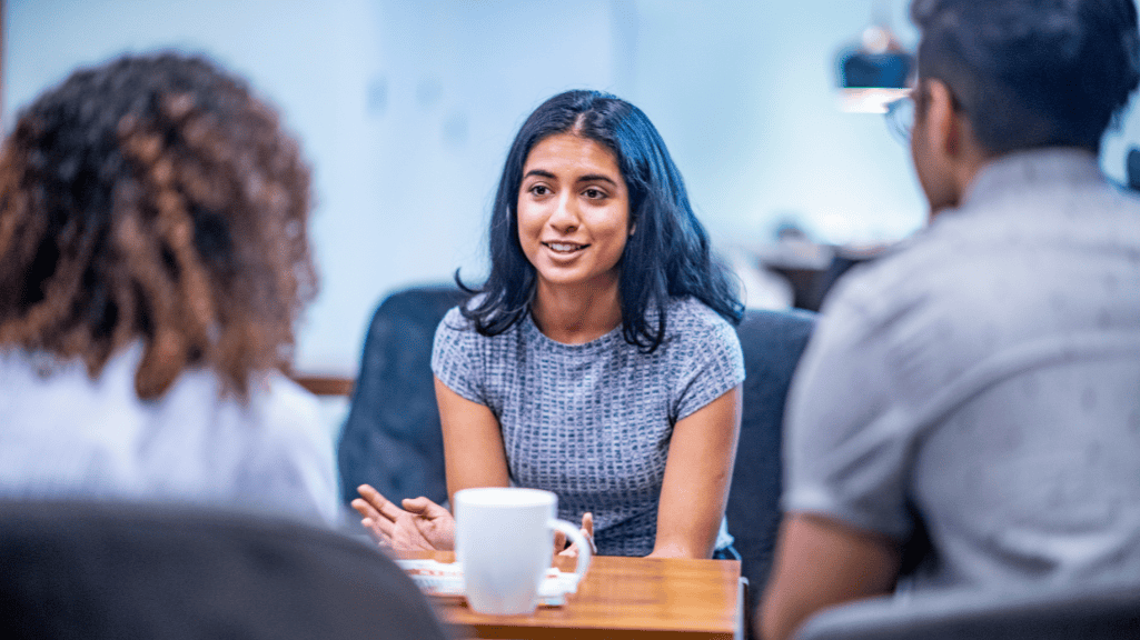 Woman discussing fertility options with counselor at Nandi IVF clinic.