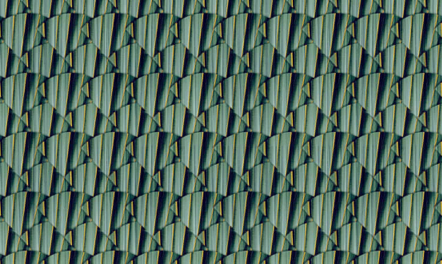 Vibrant geometric patterned wall decor with green and blue tones for modern interior design.