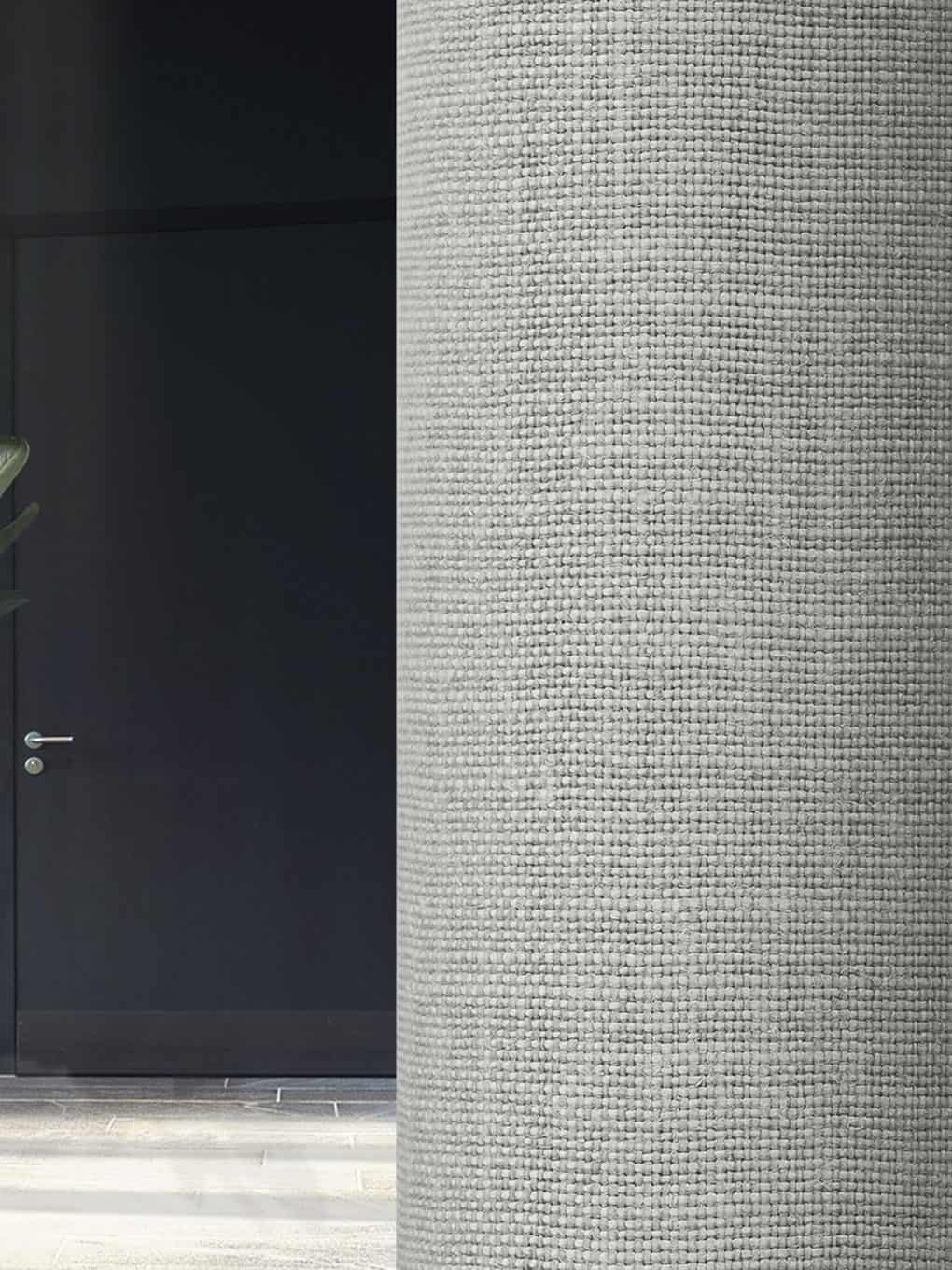 Modern textured wall surface with intricate fabric-like pattern for stylish interior decor.