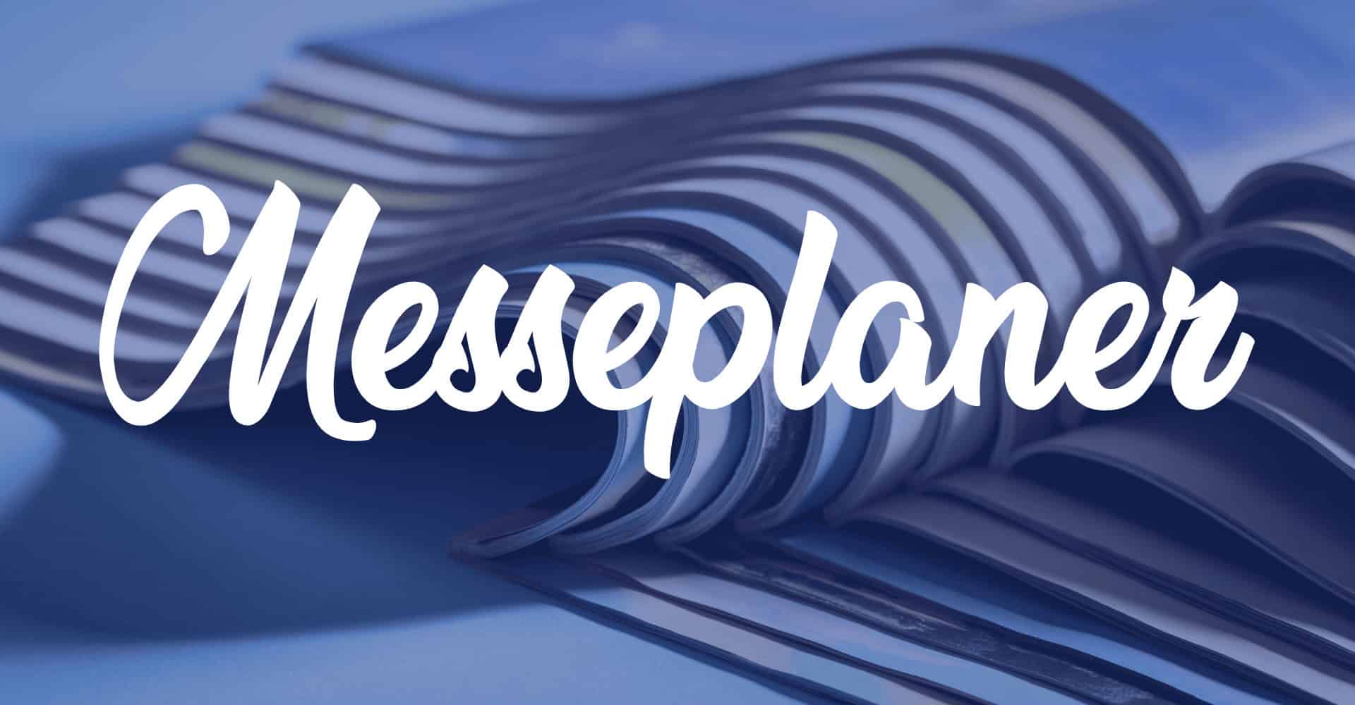 Messeplaner Schriftzug auf einer modernen, blauen Oberfläche.