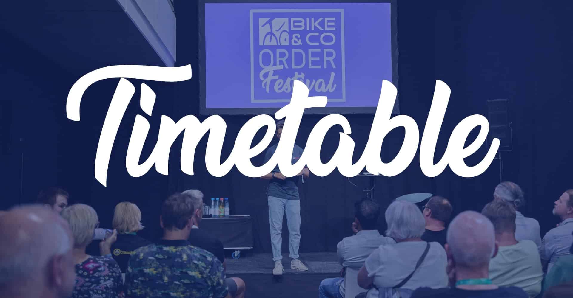 Veranstaltungstafel für Bike & Co Order Festival mit Publikum.