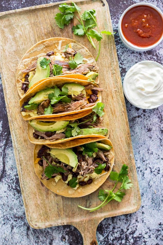 An overhead shot of Slow Cooker Carnitas Breakfast Tacos