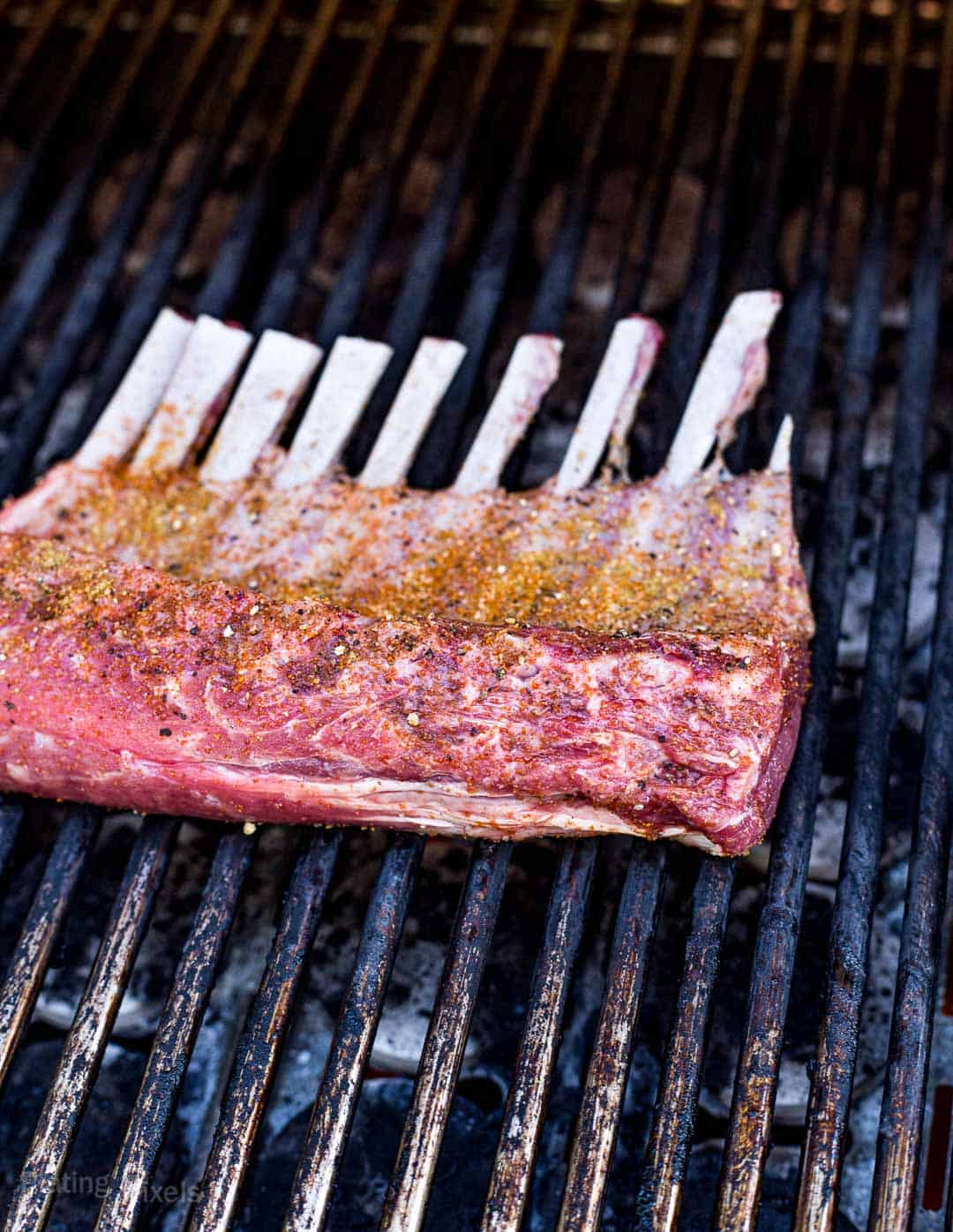 Rack of lamb just added to a gas grill