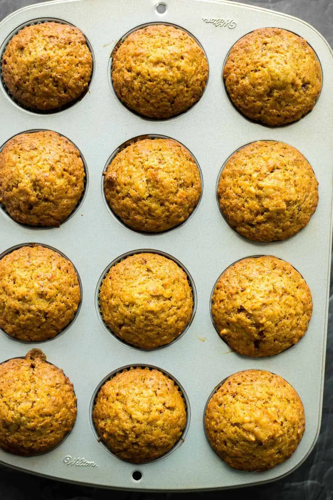 Just baked Carrot Cake Cupcakes in a baking pan