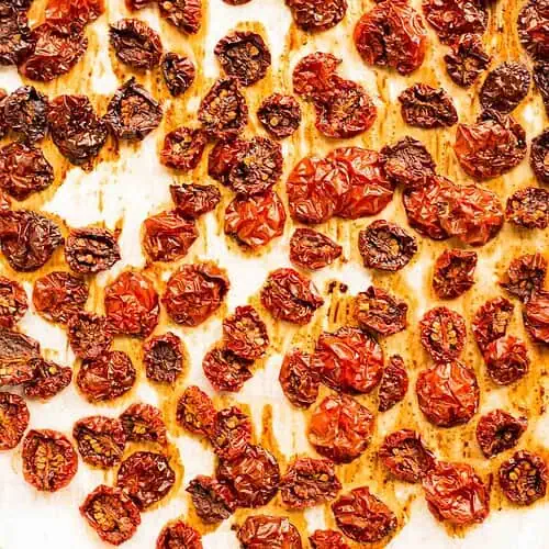 Just baked Oven Dried Tomatoes on a baking sheet