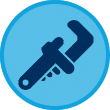 Dark blue icon of a pipe wrench on a light blue circular background, representing the "Plumb it Heat it Cool it" service.