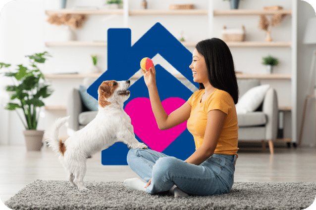 A woman sits on the floor holding a ball for a small dog indoors, with a house and heart graphic in the background—showing home is where you Plumb it, Heat it, Cool it, and love it.
