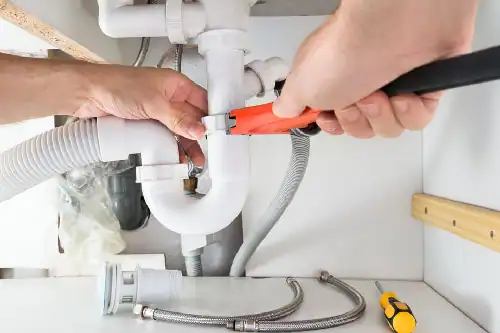 plumber-fixing-a-pipe