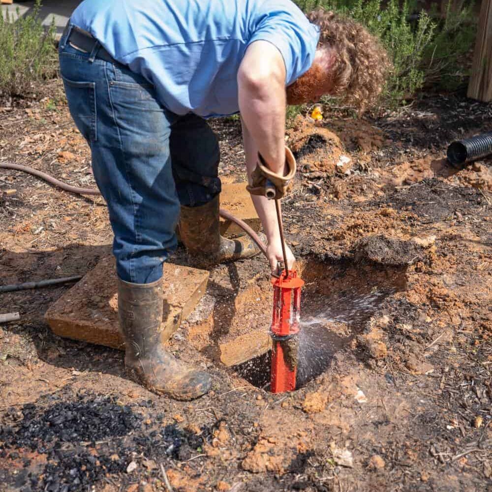 Plumber-Conducting-Septic-Repair