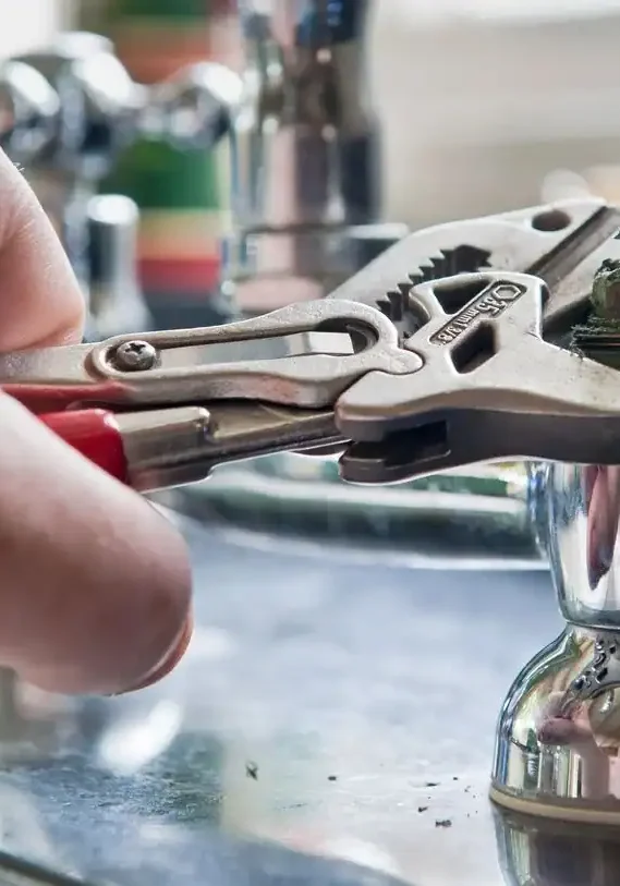 Plumber-Fixing-a-Faucet