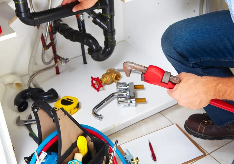 Plumber-Fixing-A-Drain-Pipe