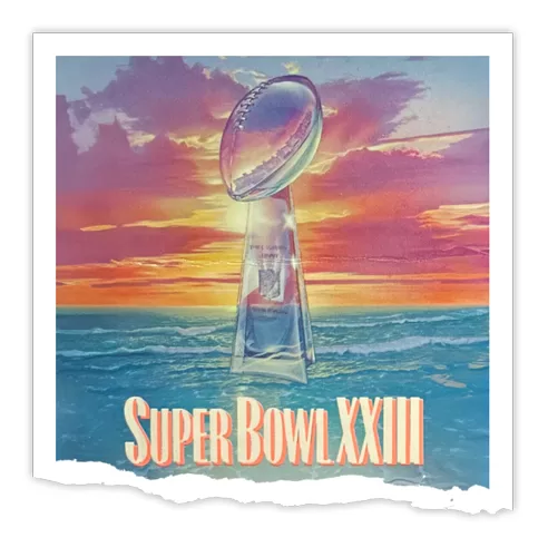 Artwork featuring the Super Bowl XXIII trophy against a colorful sunset background.