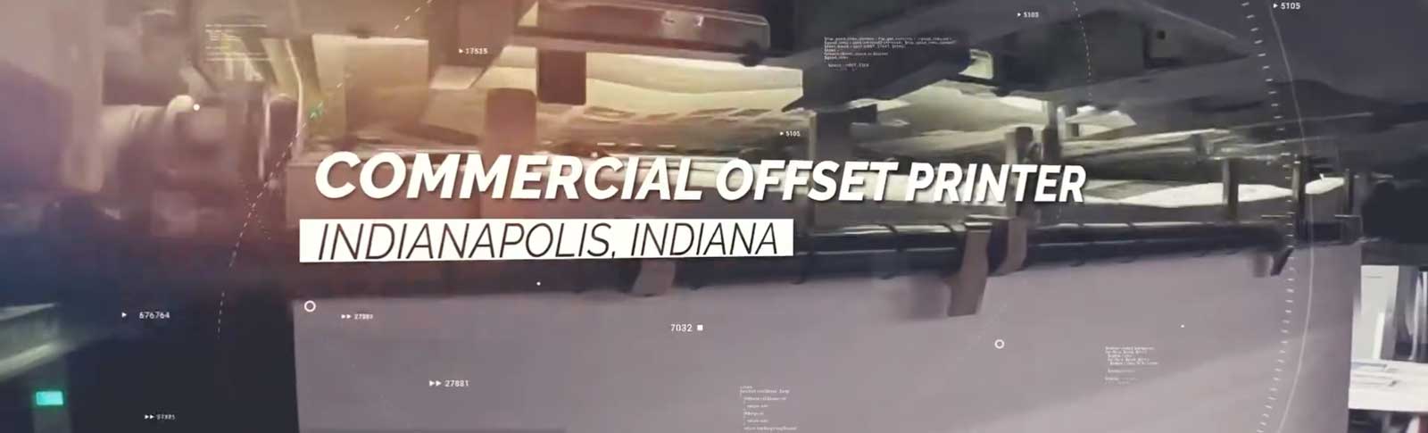 Commercial offset printer machine in operation in Indianapolis, Indiana.