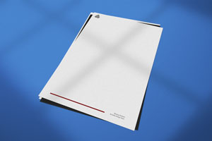 White letterhead and second sheet printed on a blue background.