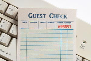 Blank Guest Check and Computer keyboard