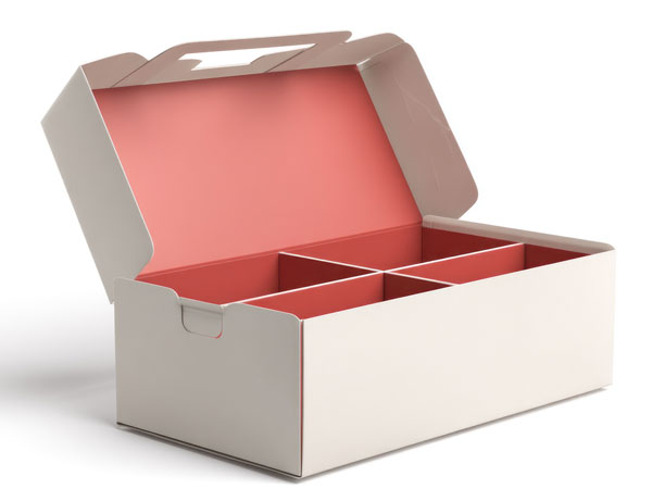 Open custom packing box with a white exterior and red interior, featuring dividers inside.