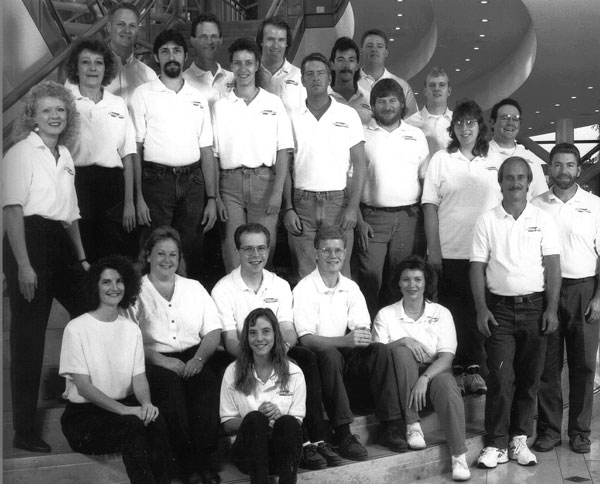 Group photo of employees from Insty, featuring Matt Hicks, Shirley Booth, and Mark Amodei.