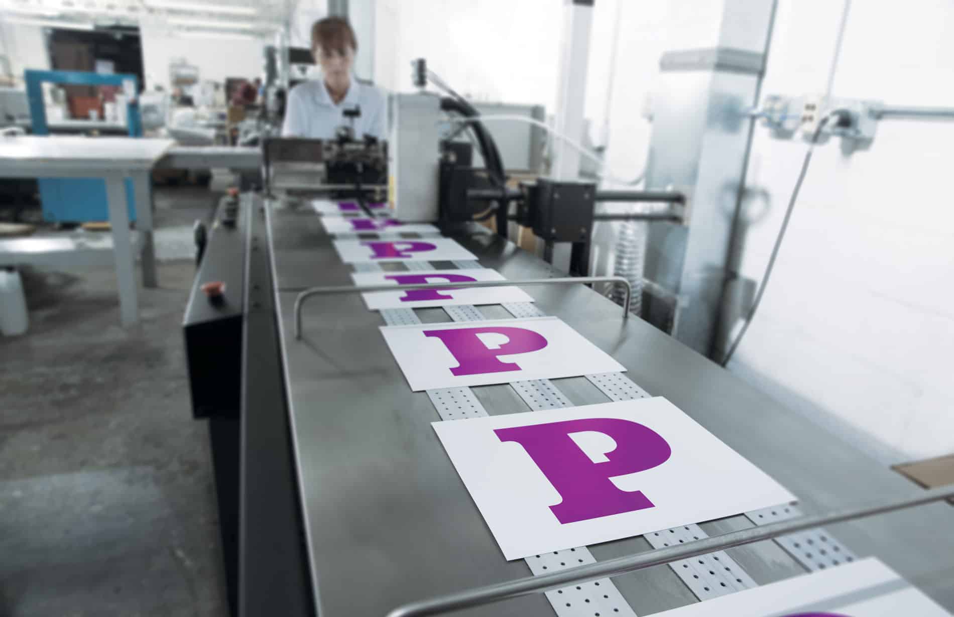 Bulk mailing department at Printing Partners preparing direct mail for USPS delivery