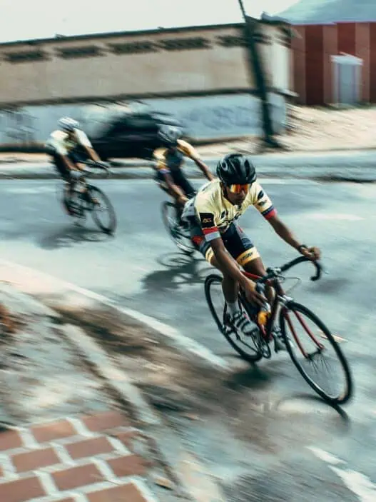 Tour de France cyclists racing through the French countryside at high speed