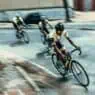 Tour de France cyclists racing through the French countryside at high speed