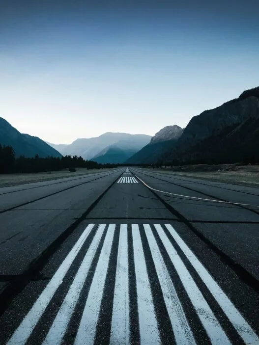 Breathtaking airport landings at challenging terrain with private jets approaching dramatic mountain airports