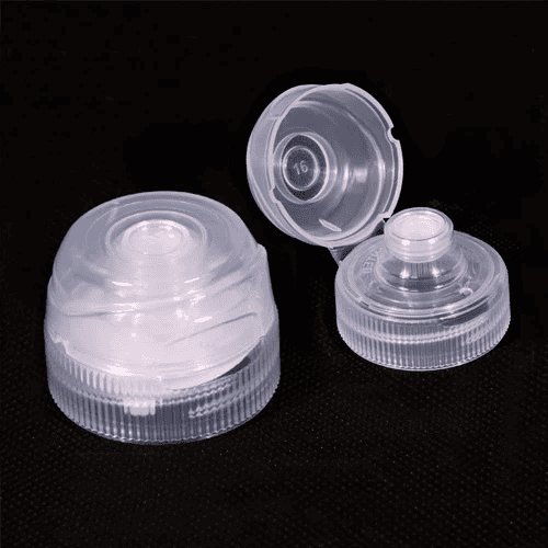 Reagent bottle caps, clear plastic for laboratory use, close-up with cap open, durable cap design for secure sealing, suitable for scientific and pharmaceutical applications.