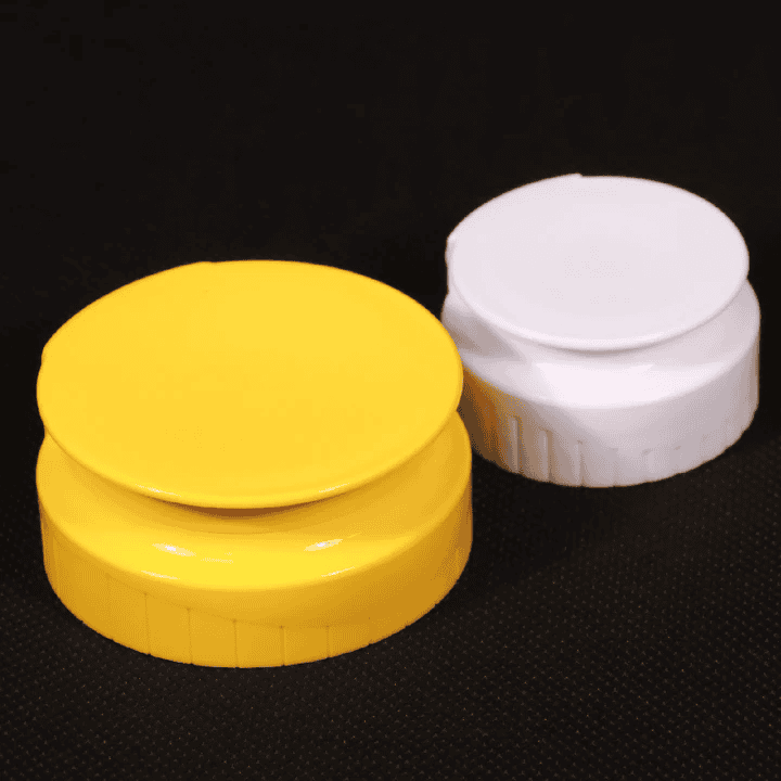 Yellow and white poker chips used for casino games and gambling.