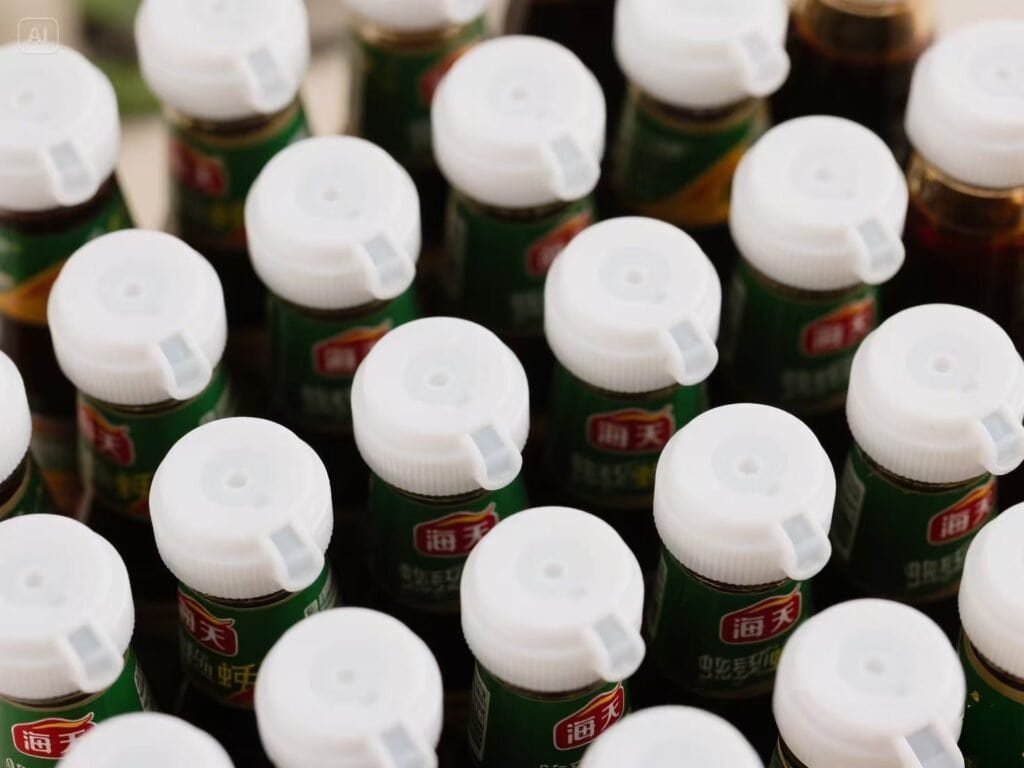Bottles of dietary supplements or herbal medicine in green packaging with white caps, displayed in a close-up shot. Suitable for health, wellness, and traditional herbal product SEO.