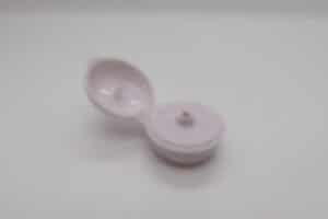Silicone breast implant with smooth surface, illustrating cosmetic and medical use, placed on a plain white background for aesthetic and educational purposes.