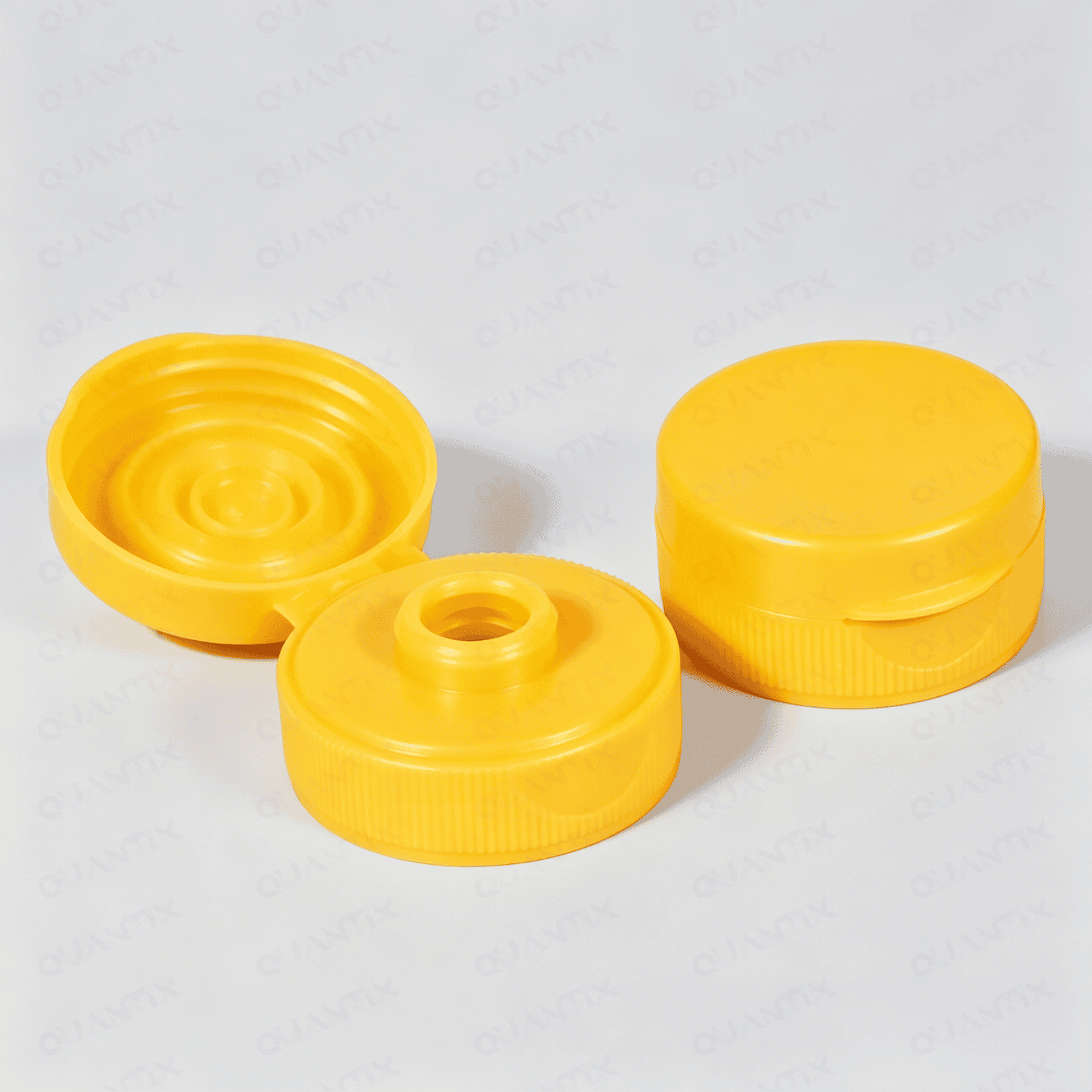 Bright yellow flip top plastic caps ideal for bottles, offering secure sealing and easy opening for beverages and liquids.