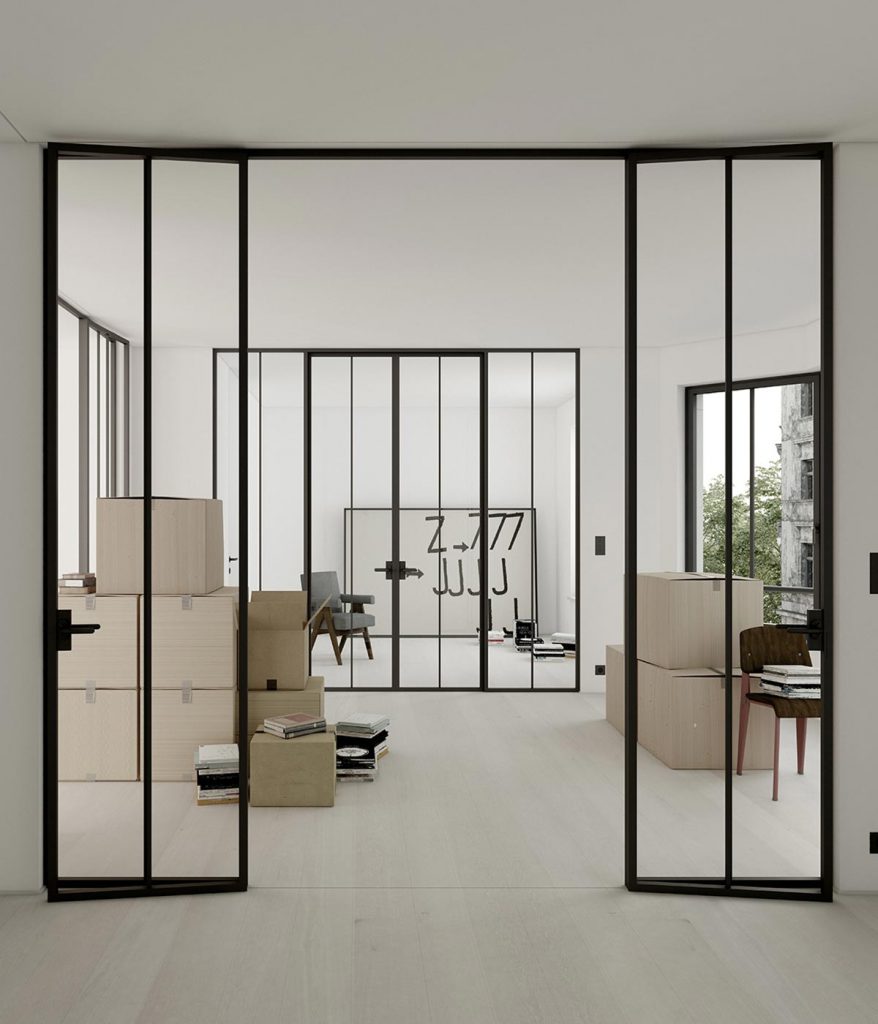 Appealing components: Floor-to-ceiling doors give the minimalist interior an unusual character. Truly masterful metalwork is required to make such difficult work look so light and easy