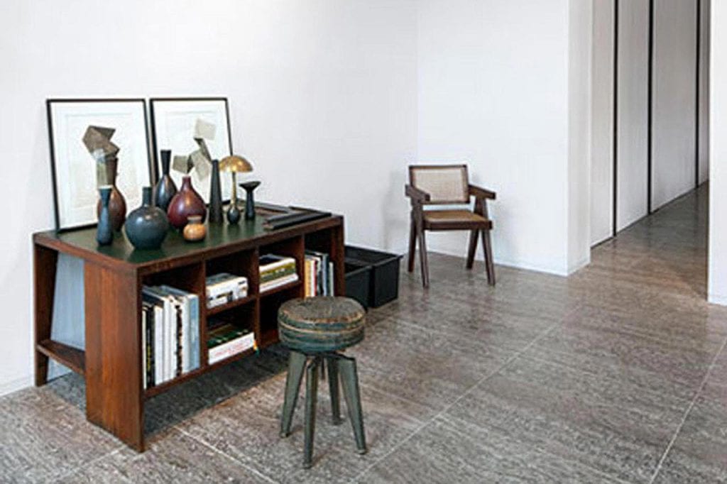 Oliver Jungel has stylishly combined Pierre Jeanneret seating, fine ceramics and industrial chic