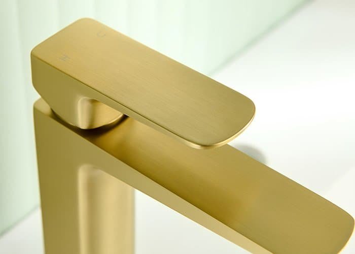 Close shot of PVD brushed gold bathroom faucet with single handle sleek modern design - B00201431