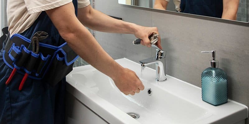 male-plumber-working-fix-problems-client-s-house – 800400 male plumber working fix problems client s house 800400