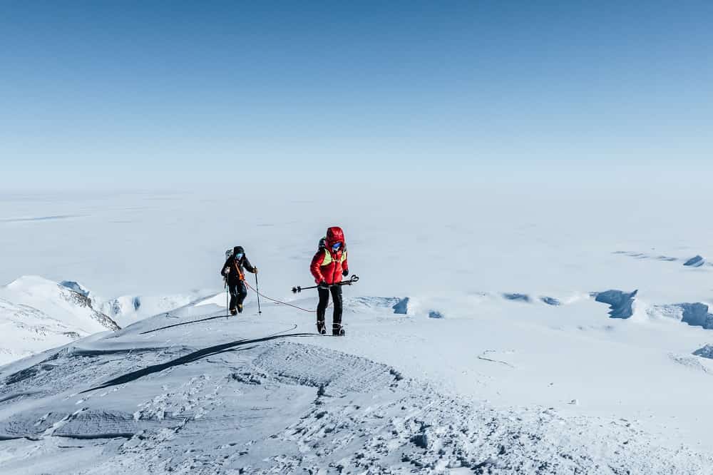 Fernanda Maciel and Sam Hennessey in Antarctica. Credit: Jordan Manoukian / Red Bull Content Pool