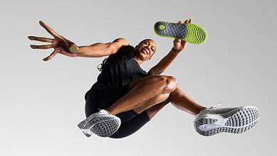 Athlete mid-air in a dynamic running pose, showcasing athleticism and energy, wearing modern running shoes.