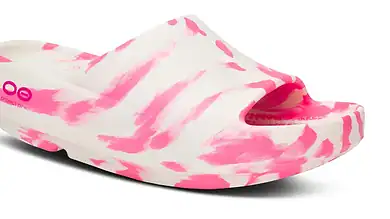 Lightweight running shoe with pink and white tie-dye pattern, designed for comfort and performance during running activities.