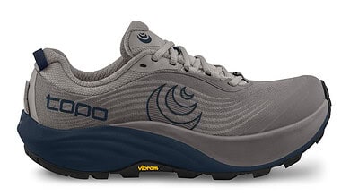 Light grey and navy blue trail running shoe with Vibram sole, designed for outdoor running and trail adventures.