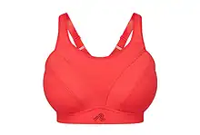 Red sports bra designed for running and athletic activities, featuring supportive straps and breathable fabric.