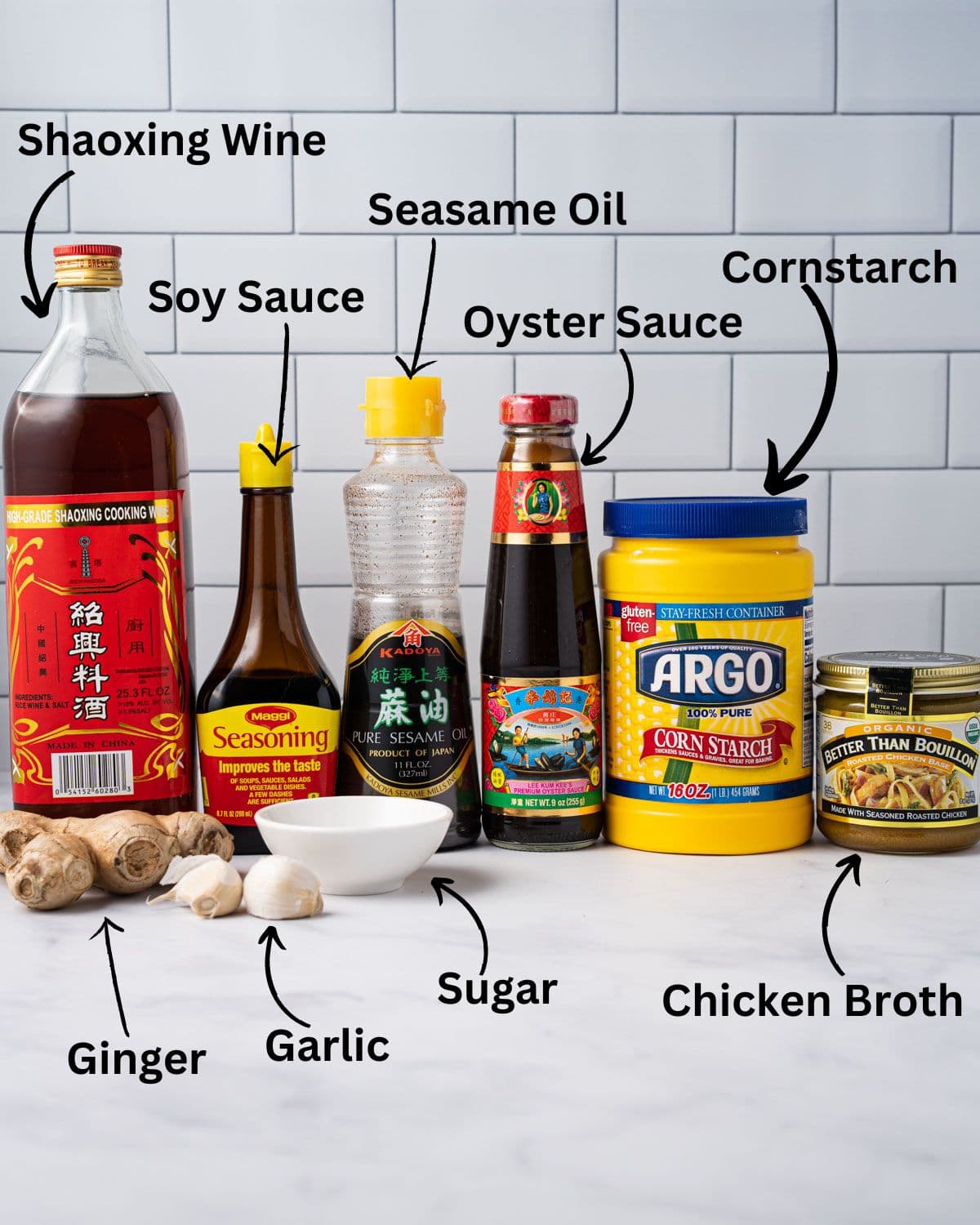 Ingredients needed for mi xao gion sauce: shaoxing wine, soy sauce, sesame oil, oyster sauce, cornstarch, chicken broth, ginger, garlic, and sugar.