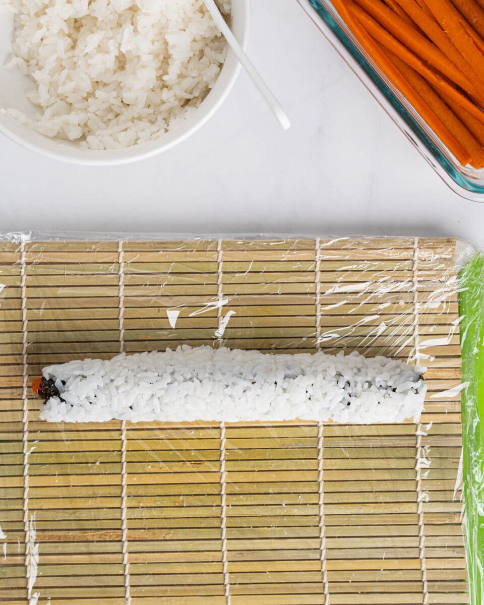 gobo sushi on a sushi rolling mat.